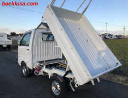 1997 Mitsubishi Minicab, Soft Dump  Drive: 4WD  - Engine: 660 cc - Condition: 3.5/B - Mileage: 69082 mi