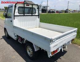 1999 Mitsubishi Minicab, Mini Truck  Drive: 4WD  - Engine: 660 cc - Condition: 4/B - Mileage: 23623 mi