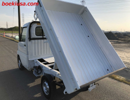 2001 Mitsubishi Minicab, Soft Dump  Drive: 4WD  - Engine: 660 cc - Condition: 4/B - Mileage: 66082 mi